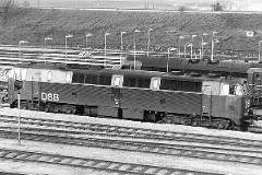 DSB MZ 1401 (type I) photographed in Fredericia 5. March 1978.   The MZ class (type I and II) was purchased from 1967 to 1970 in a number of 26. Only a few of these engines remain in service by DSB - most are now sold to other companies. MZ 1401 was put in service in 1967. Withdrawn from service in 2000 and given to DSB Museumstog. Built by NOHAB and Frichs. Dieselelectric. Co'Co'. 2270 kW - 3300 hp. Max speed 143 km/h - 89 mph. Length 20 800 mm. Weight 116,5 metric tonnes.